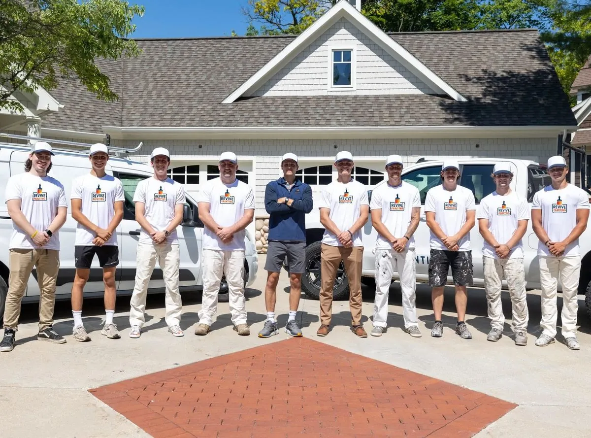 The Revive Painting crew outside a finished project